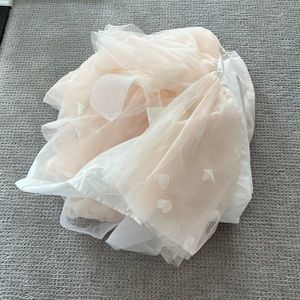 Crib bed skirt from the pottery barn kids Monique Lhuillier collection